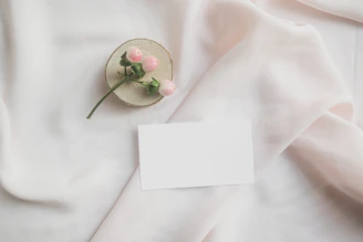 white paper on white textile