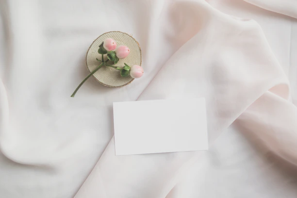 white paper on white textile