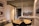 white ceramic sink near brown wooden table