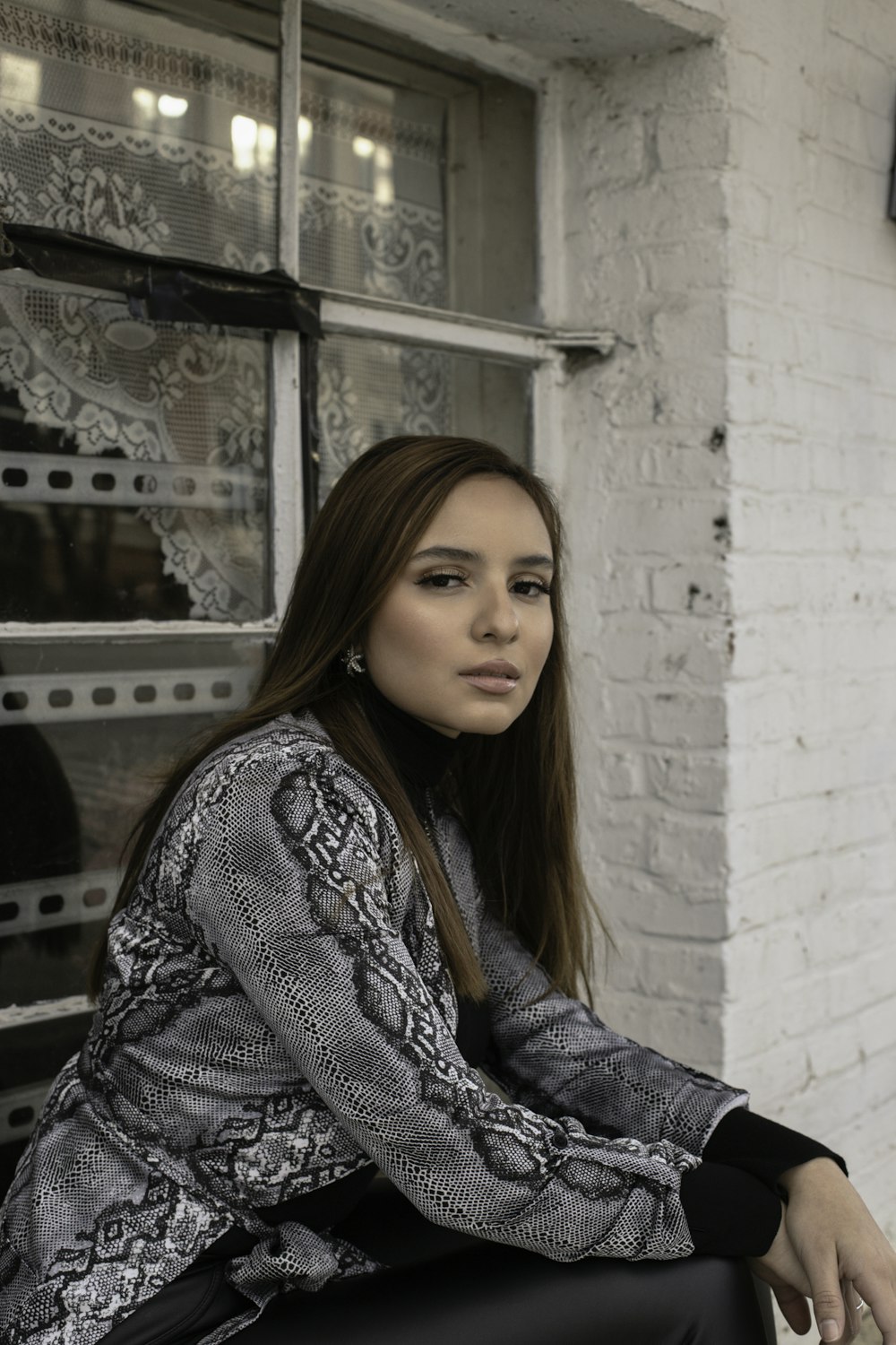 woman in black and white long sleeve shirt