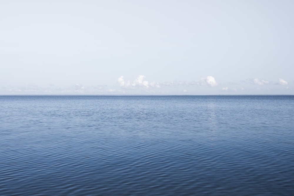 blue sea under blue sky during daytime