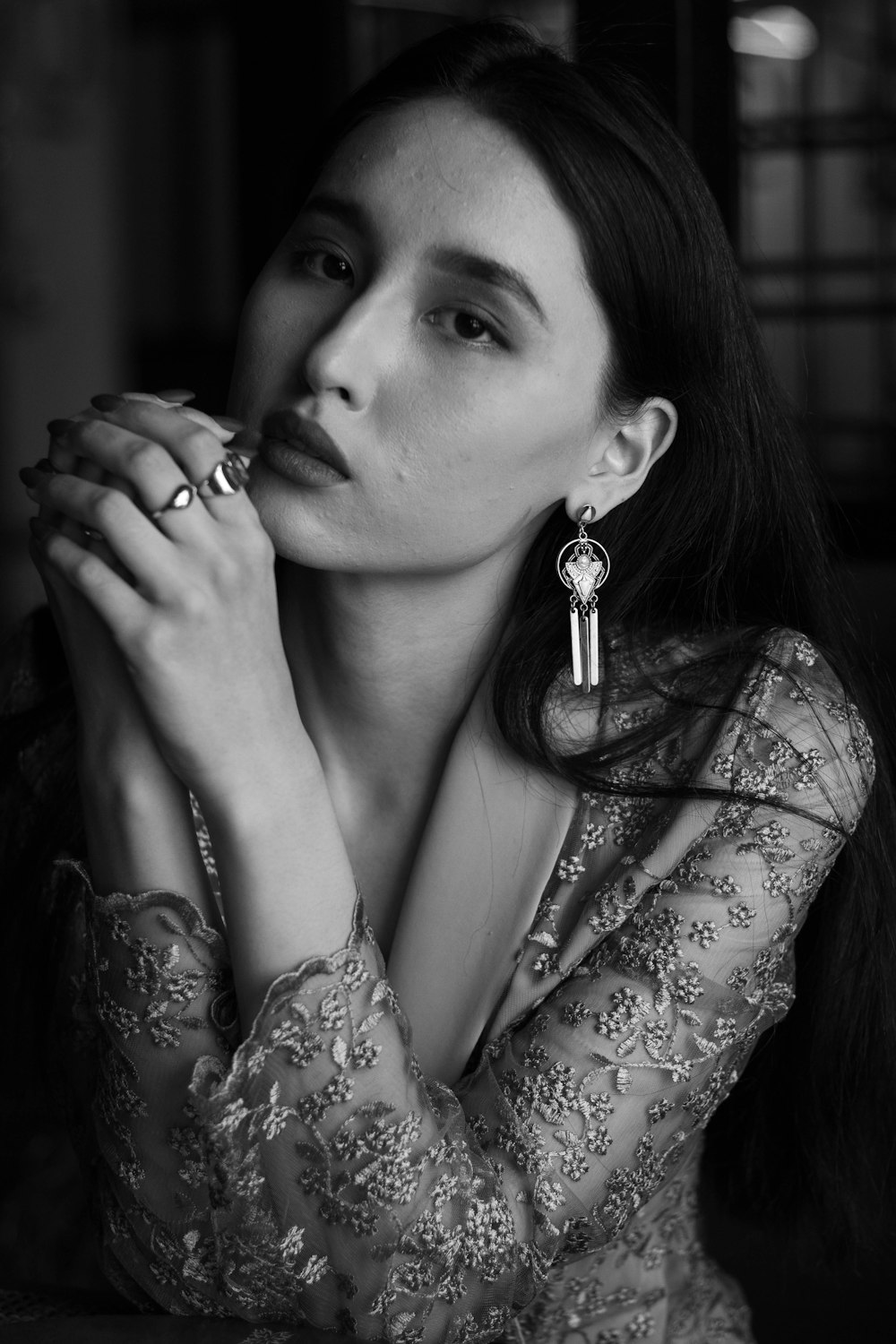 woman in white and black floral dress