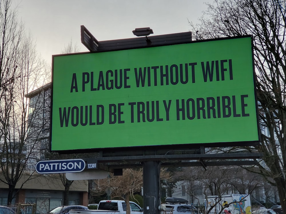 a large green sign that says a plague without wifi would be truly horrible