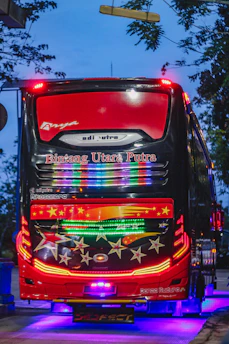 Bright LED advertising screen inside a moving urban bus displaying colorful brand content.