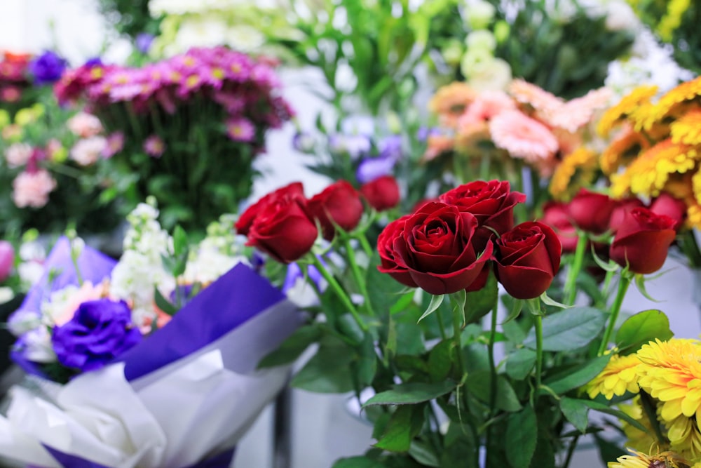 a bunch of flowers that are in a vase