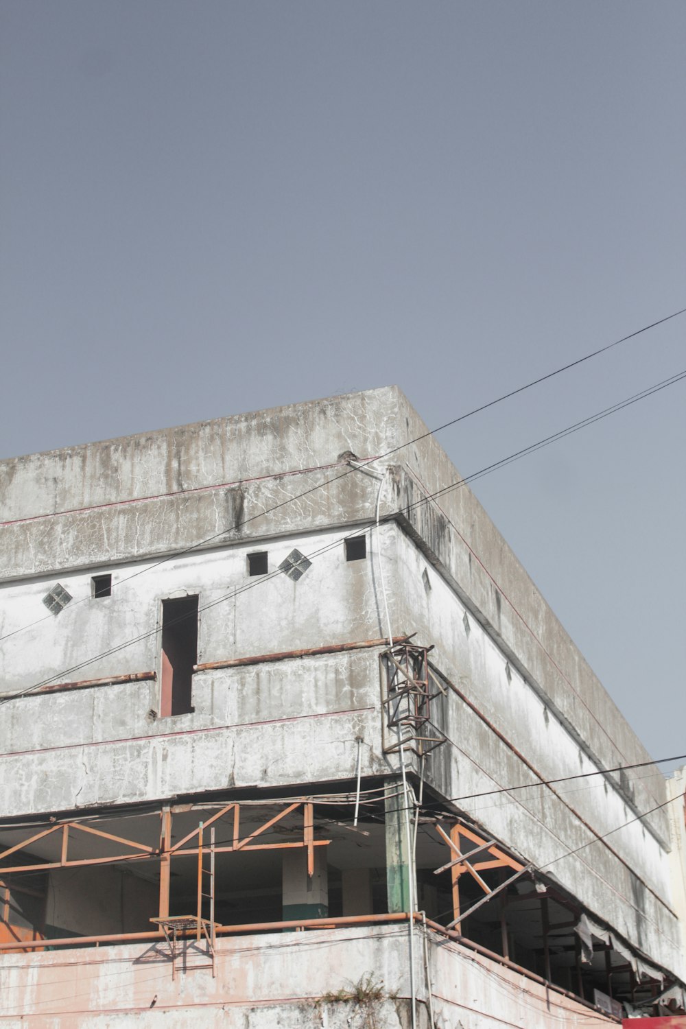 white concrete building under blue sky during daytime