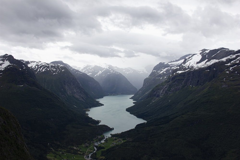 lake in the middle of mountains