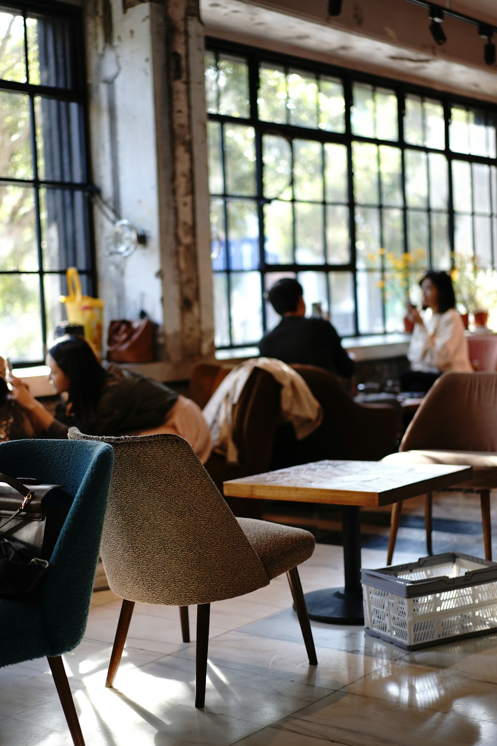 people sitting on chair in restaurant