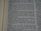 A close-up image of a book page with text in a serif font. The text appears to be a narrative passage, with focused lines in the center and slightly blurred lines at the top and bottom, indicating a depth of field effect.