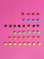 pink and yellow round beads