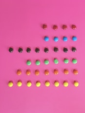 pink and yellow round beads
