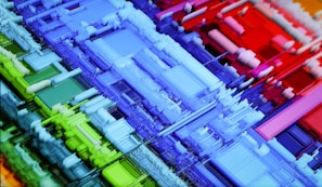 A vibrant 3D graphic artwork showcasing colorful geometric shapes.