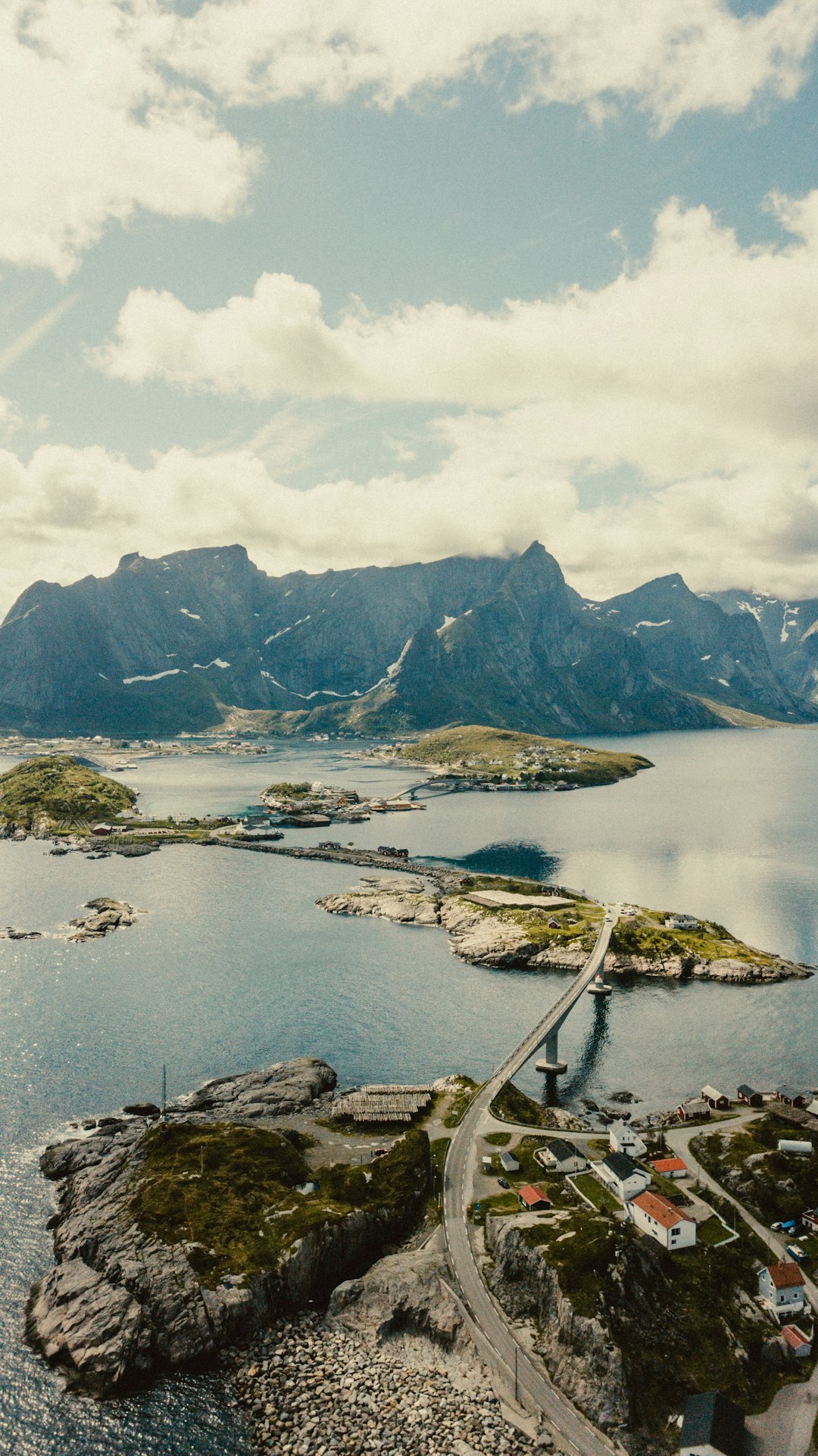 aerial view of lake and mountains during daytime