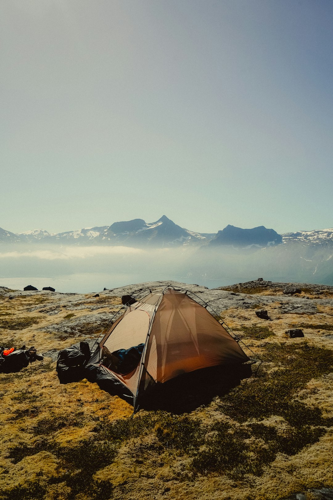 gray tent on brown field during daytime