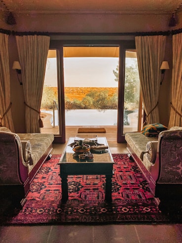 Spacious suite with elegant Mexican decor and seating area.