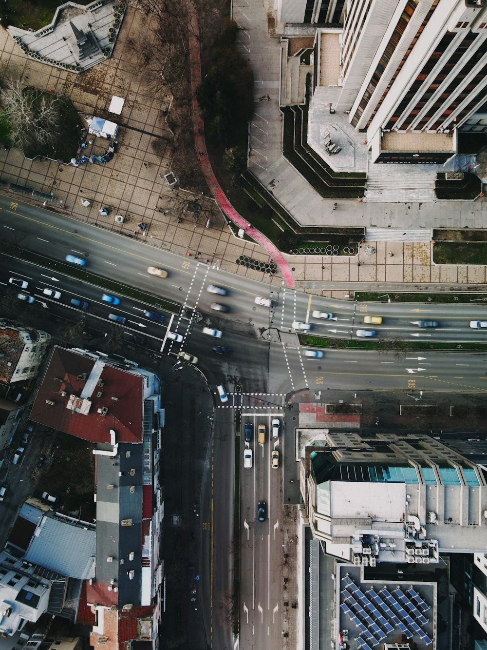 cars on road near buildings during daytime