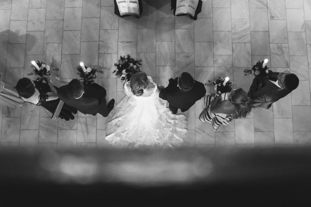 grayscale photo of people in a room