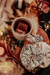 A serene workspace bathed in soft natural light with cozy cushions and a steaming cup of tea.
