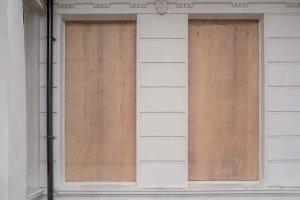 boarding up windows to homes and businesses