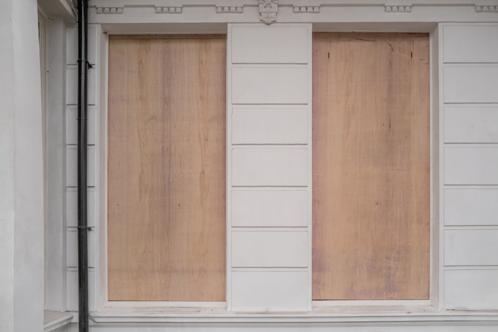 white wooden door with white wooden frame