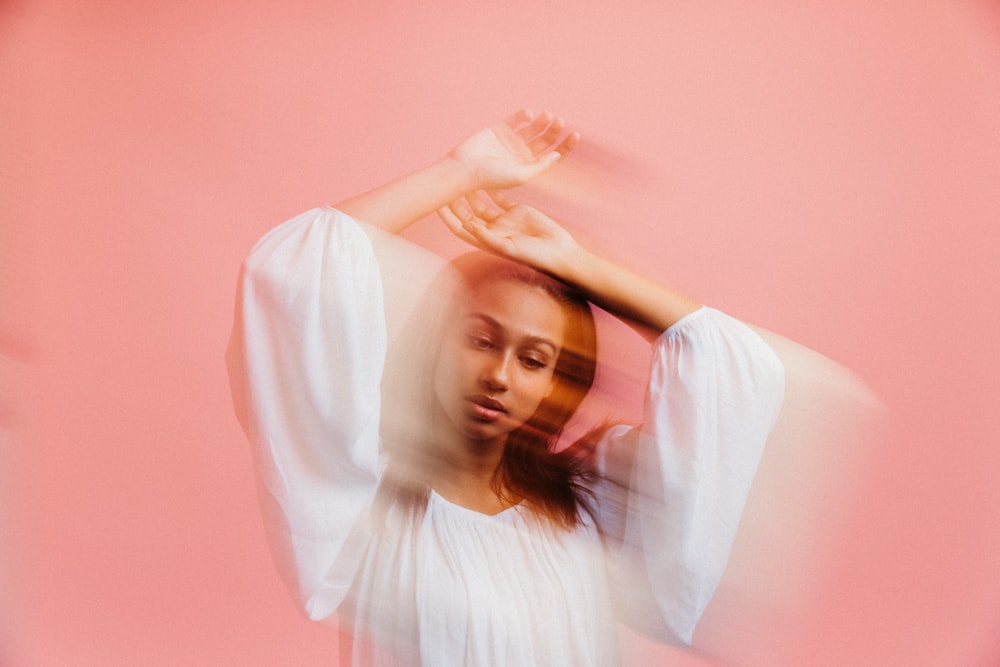 woman in white long sleeve shirt