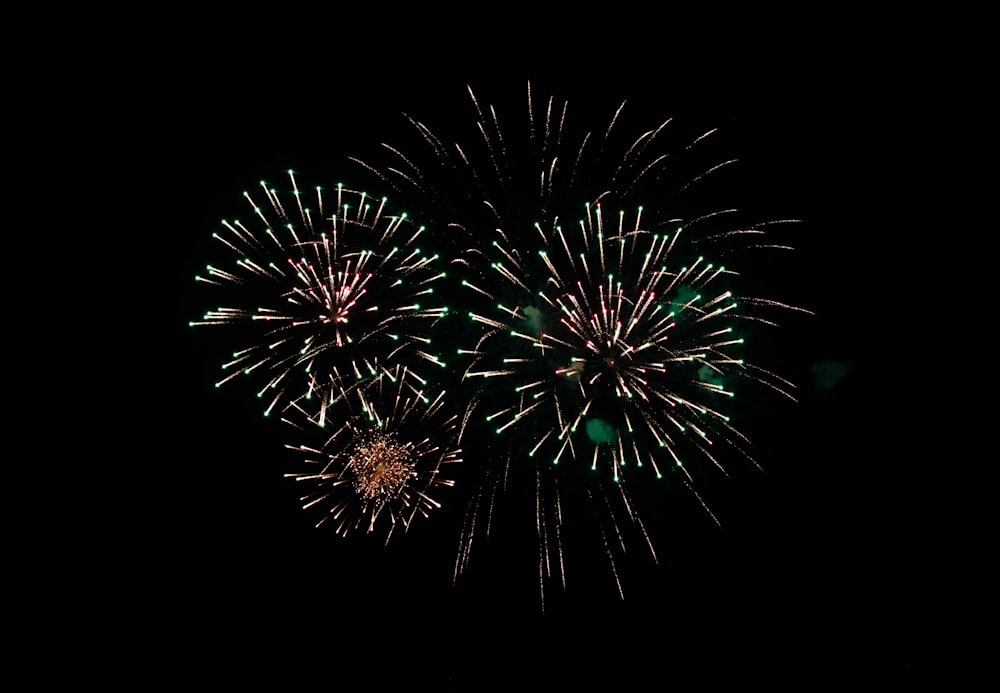 green and pink fireworks display