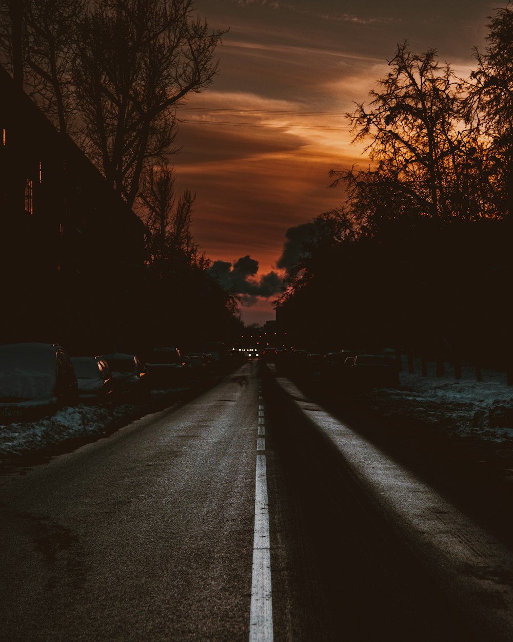 car on road during sunset