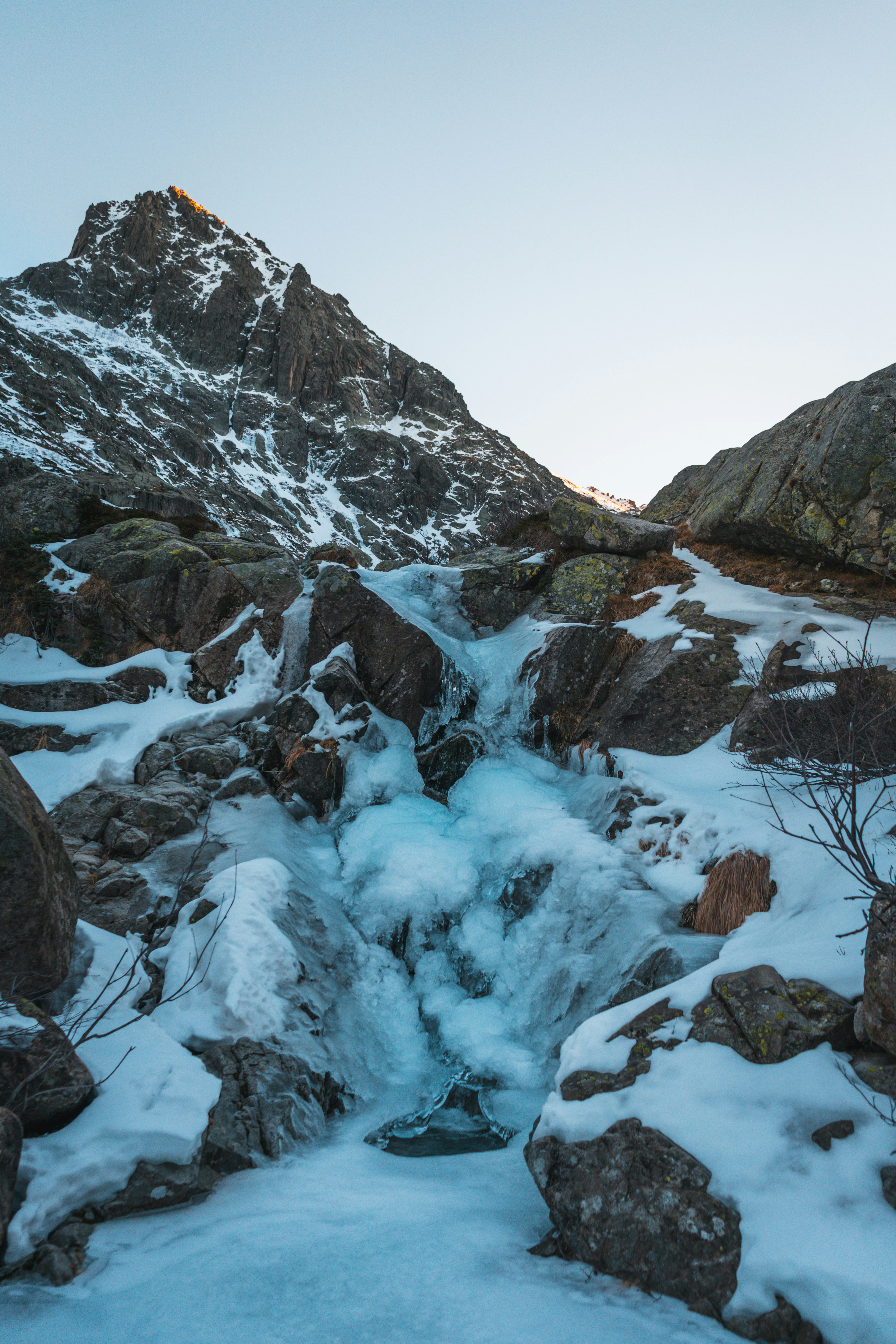 rocky mountain covered with snow