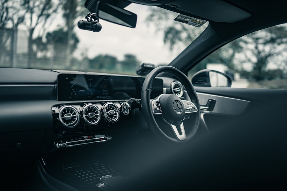 black and silver steering wheel