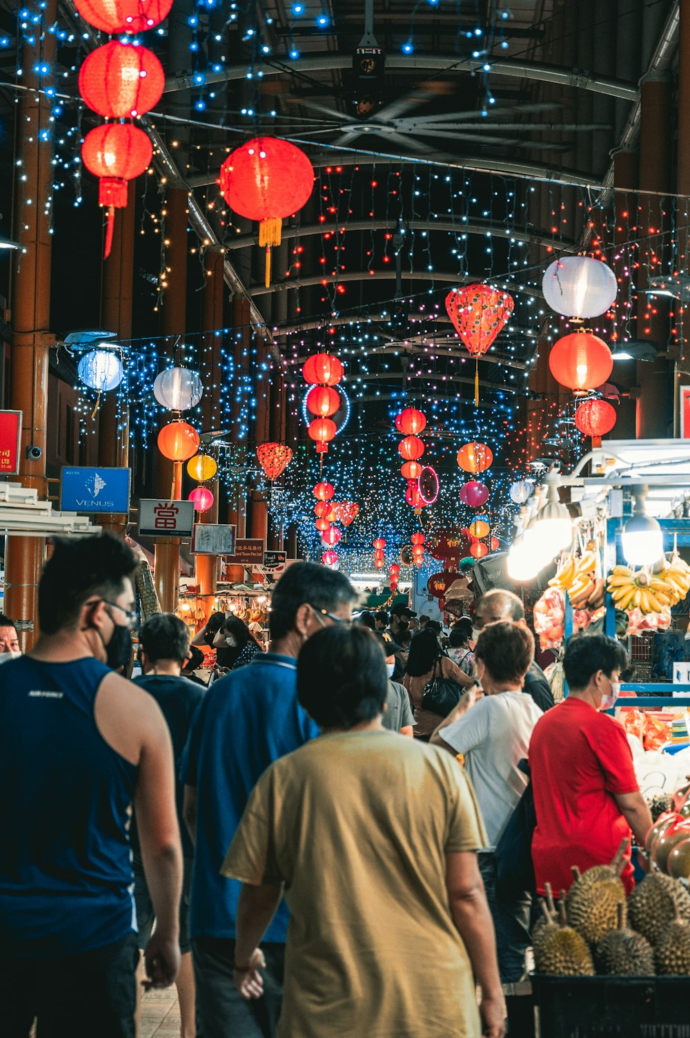 people walking on street during nighttime