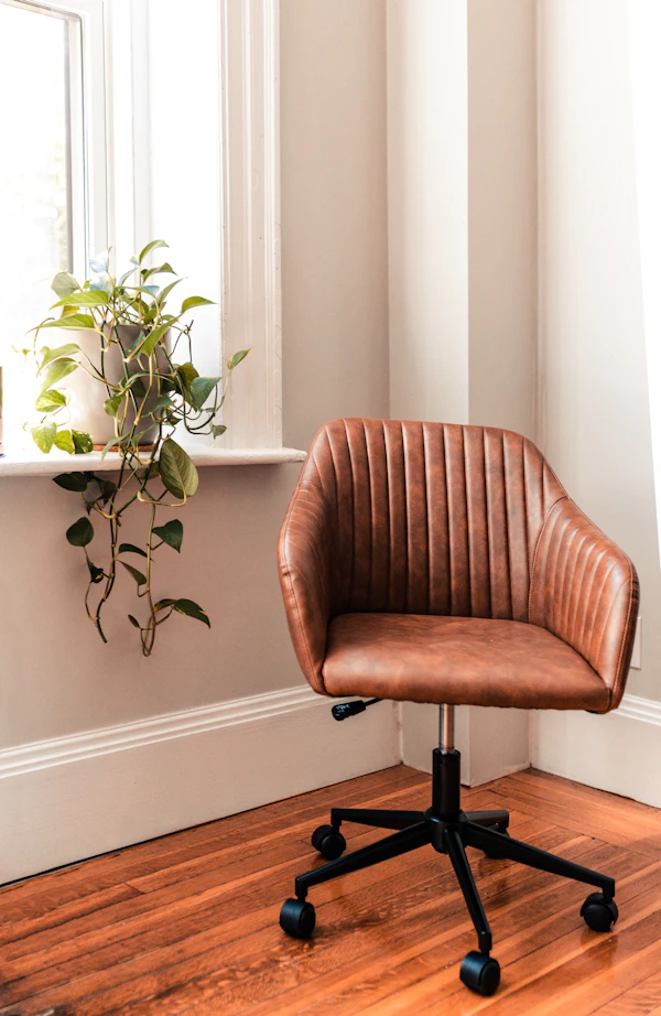 Ergonomic mesh office chair at a clean home office desk