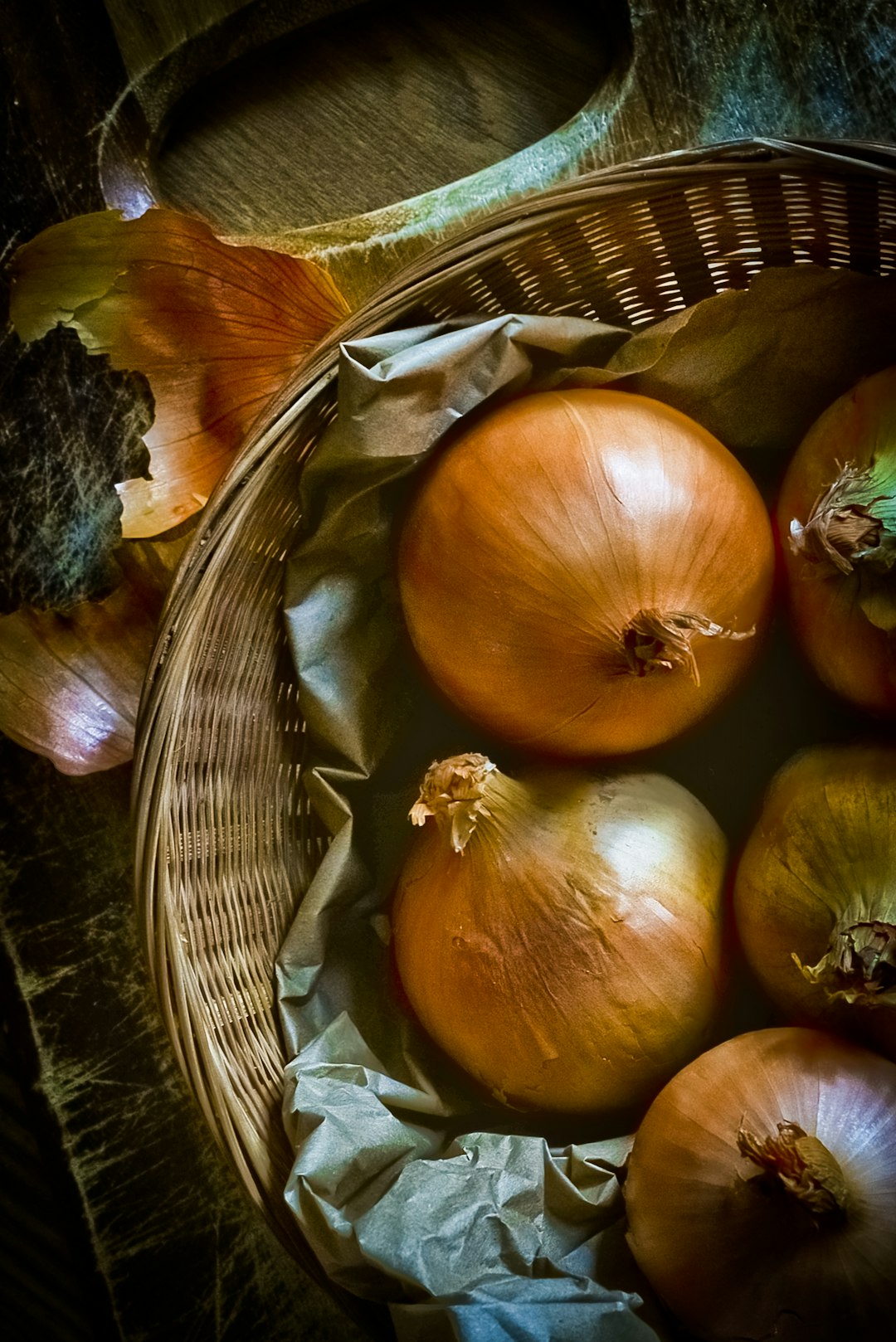 garlic on brown woven basket