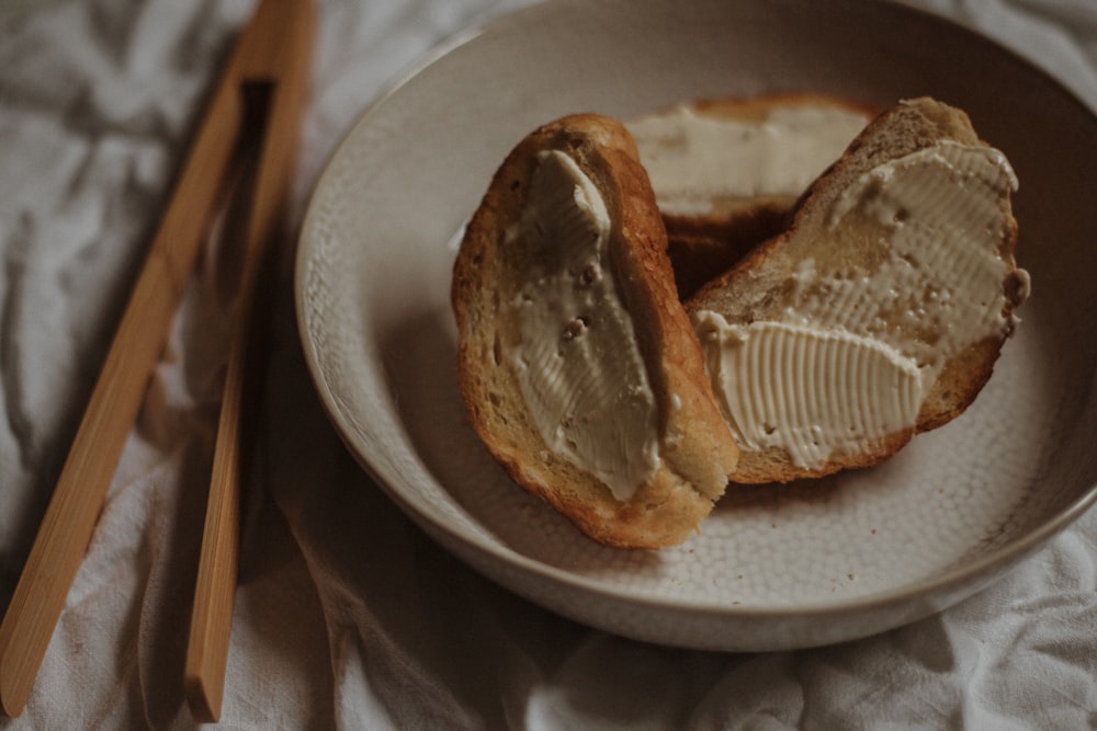 bread on white ceramic plate