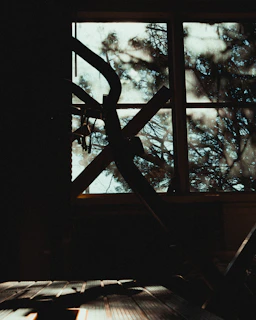 Morning sunlight casting soft shadows on a minimalist gym setup featuring Sacra Valley products.