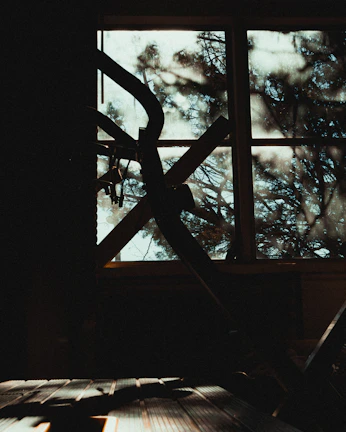 An intense workout session captured with New York City skyline visible through large windows.