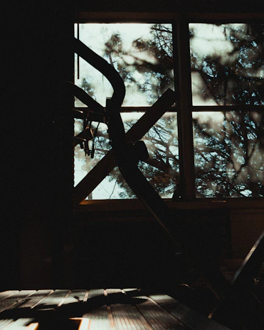 Morning sunlight casting soft shadows on a minimalist gym setup featuring Sacra Valley products.