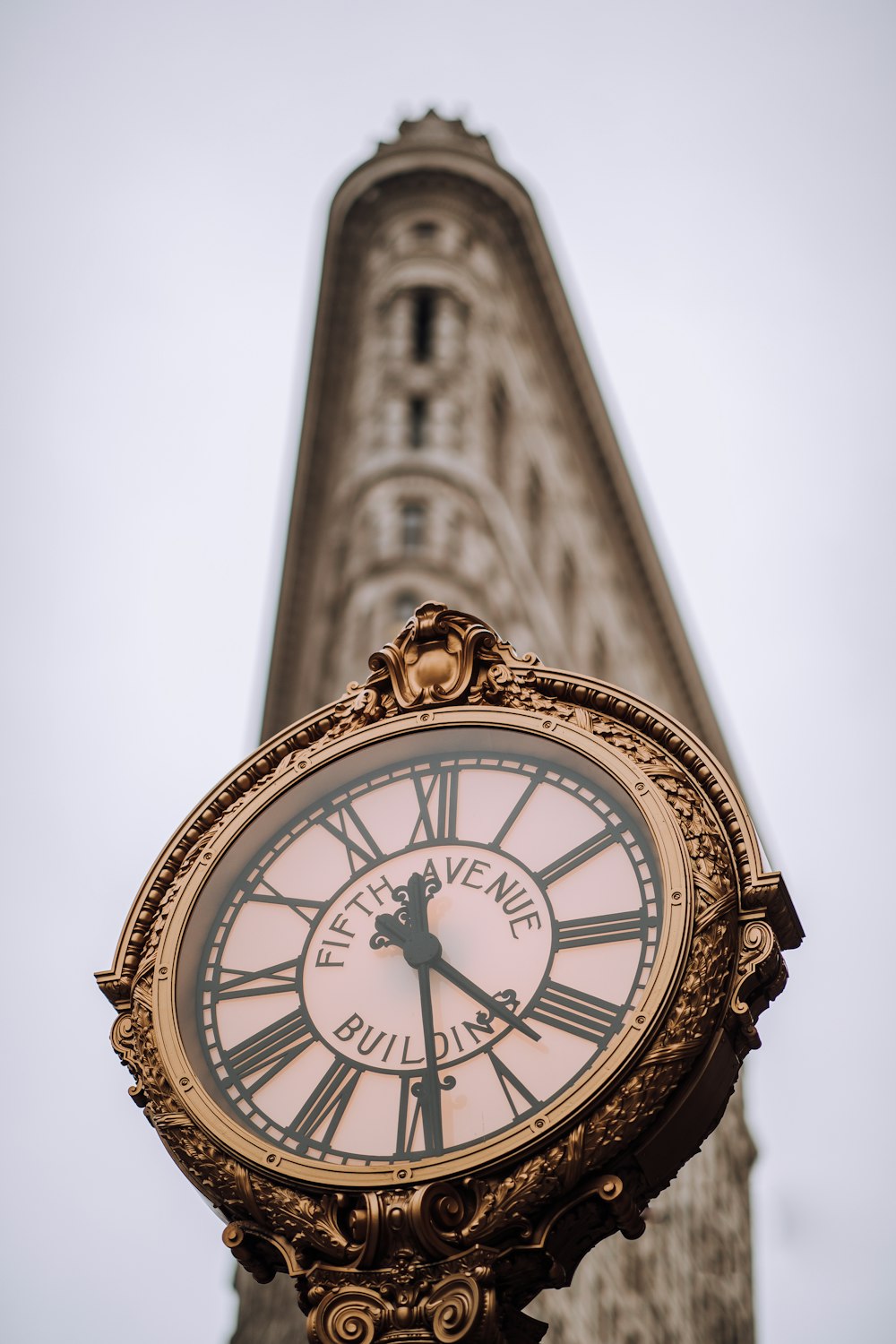 gold and white analog watch