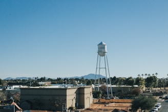 Photo of the Ironwood Canyon Law Group team standing outside their Gilbert office on a sunny day.
