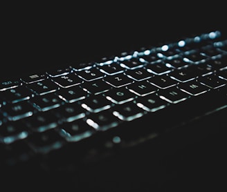 black computer keyboard on black surface