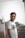 man in white crew neck t-shirt wearing black sunglasses
