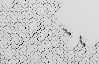 white and black polka dot textile