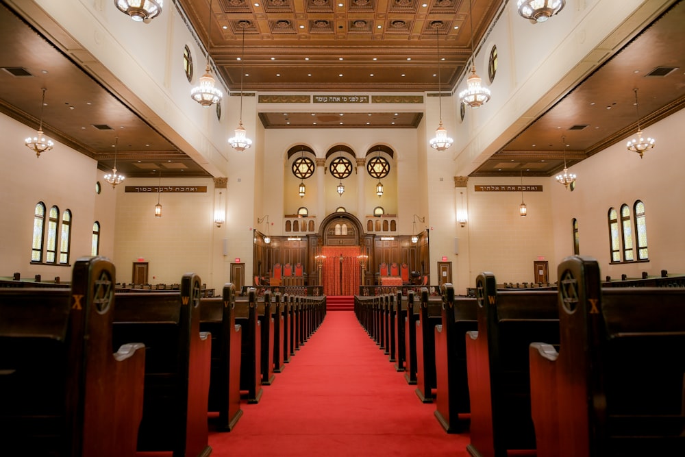 brown wooden chairs inside church