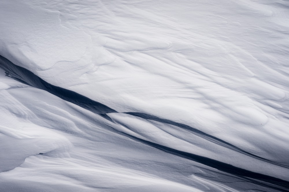 white snow covered field during daytime