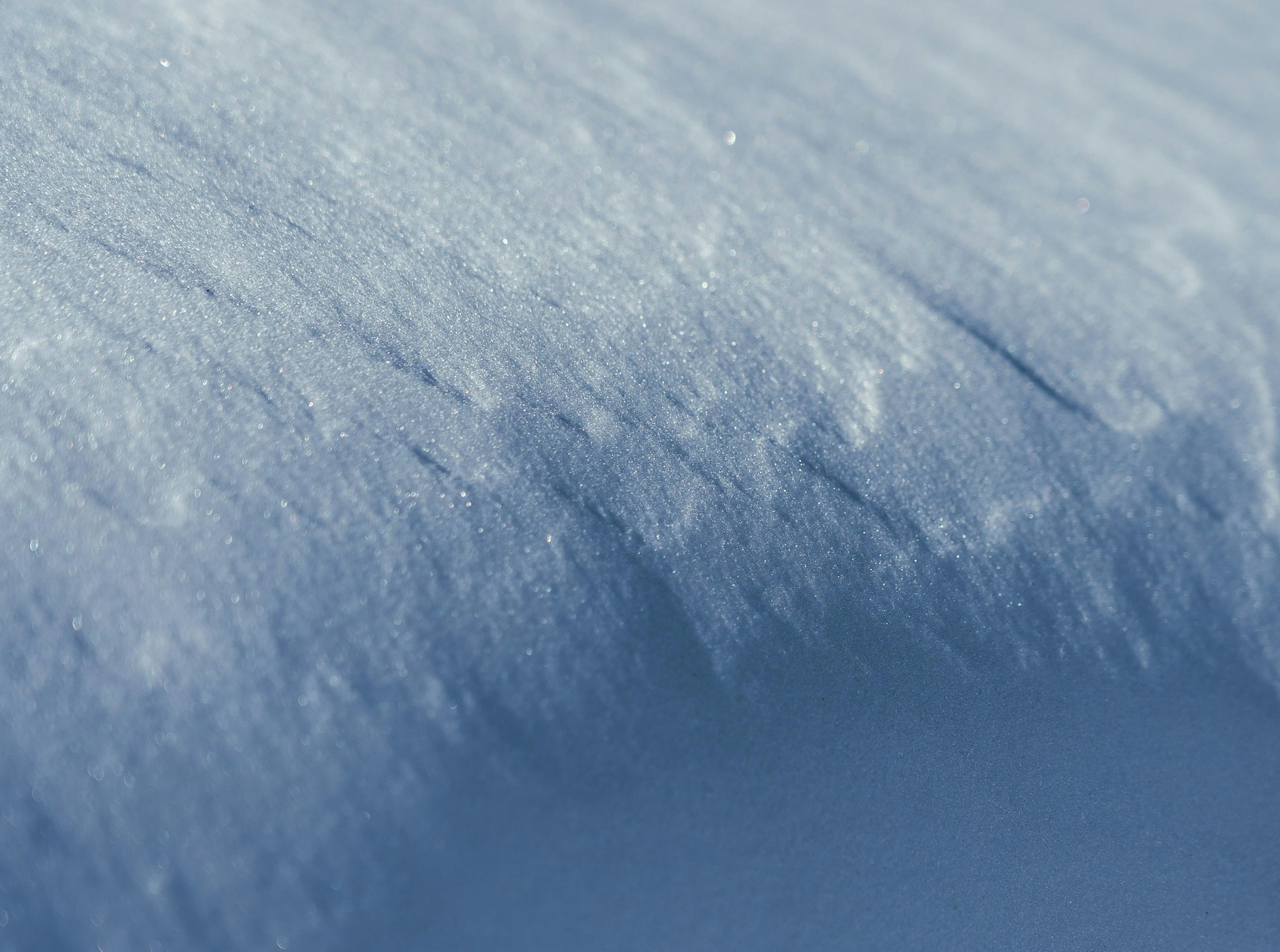 white snow on blue background