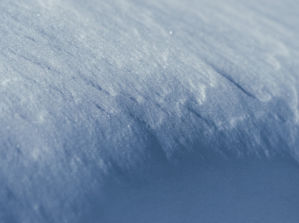 white snow on blue background