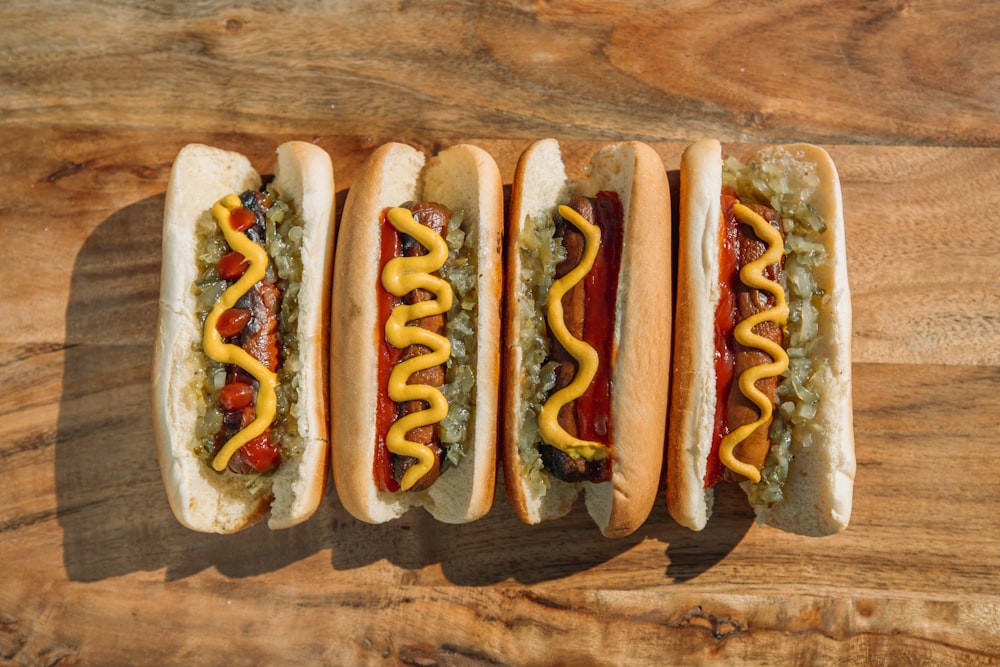 hotdog sandwich on brown wooden table