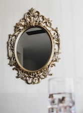 gold floral frame on white textile