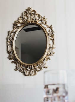 gold floral frame on white textile
