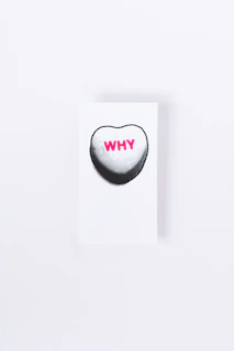 white and black heart print card