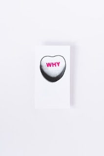 white and black heart print card
